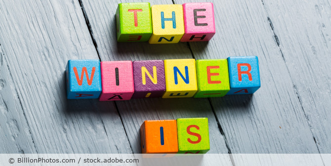 Würfel mit der Aufschrift "The winner is".
