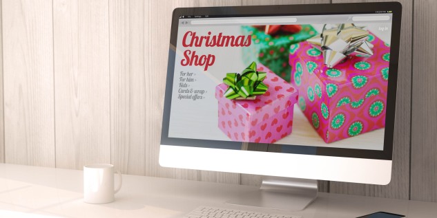 Ein Computer mit einer Weihnachtsshopping-Webseite.