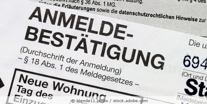 Anmeldebestätigung als Papierformular nach dem Meldegesetz.